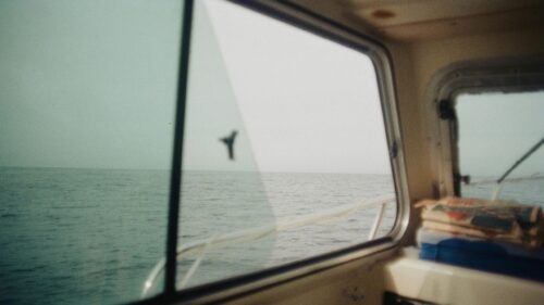 Ocean View from Boat Cabin Window Desktop Wallpaper