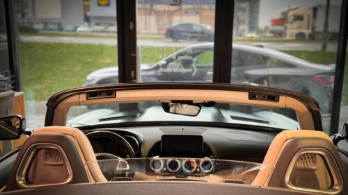 Inside the Luxurious Interior of a Convertible Sports Car 4K Wallpaper