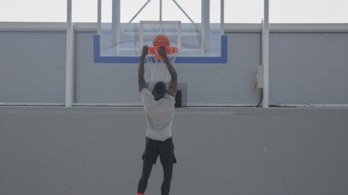 Basketball Player Slam Dunking High Jump 4K Desktop Wallpaper