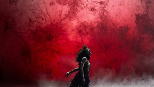 Dramatic Electric Guitar Silhouette Under Spotlight Power Ballad 4K Desktop Wallpaper