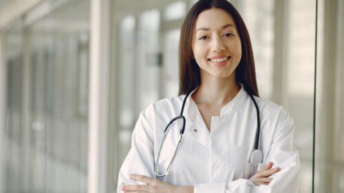 Professional Female Doctor in Medical Lab 4K Desktop Wallpaper
