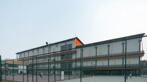 Modern Sports Complex Architecture with Playing Courts Desktop Wallpaper