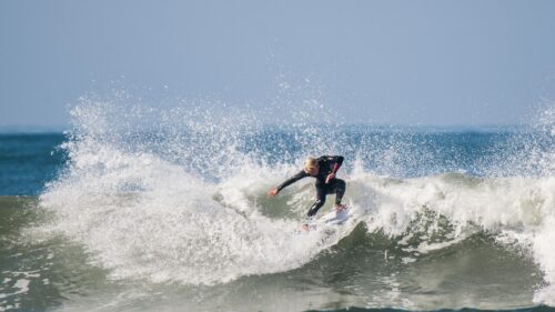Action Surfing Wave Spray Professional Extreme Sports 4K Wallpaper