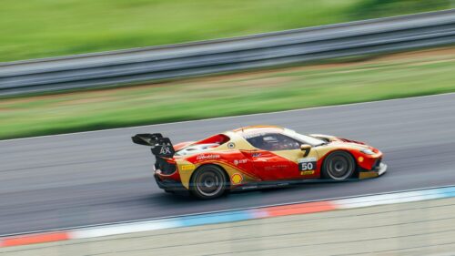 Red and Gold Ferrari 296 GT3 Racing Car Speed Motion 4K Wallpaper