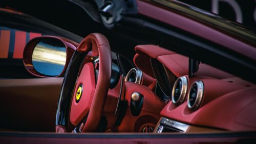 Red Ferrari Interior Luxury Sports Car Cockpit 4K Wallpaper