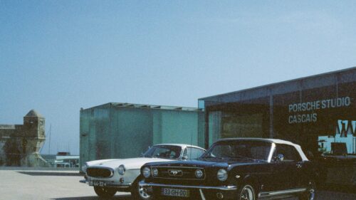 Vintage Classic Cars parked at Porsche Studio Cascais Desktop Wallpaper