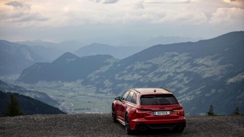 Red Audi RS6 Avant Overlooking Mountain Valley 4K Wallpaper