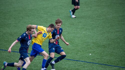 Intense Soccer Match Action Shot High-Resolution Desktop Wallpaper