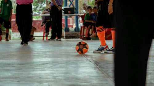 Action Futsal Soccer Ball and Player Legs Close-up PC Wallpaper