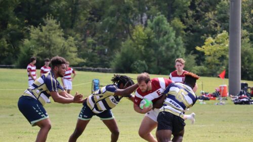 Intense Rugby Match Action During College Game Desktop Wallpaper