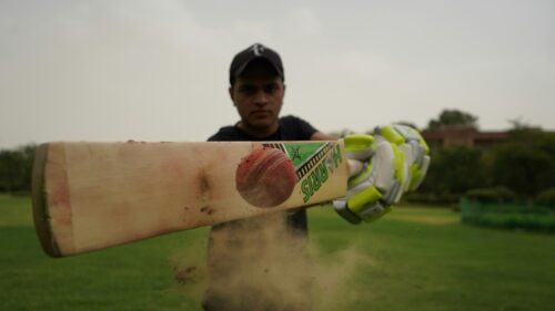 Cricketer Striking Ball Action Shot 4K Desktop Wallpaper