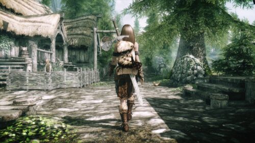 The Elder Scrolls Skyrim Dragonborn Standing on Mountain Peak Gaming Wallpaper 4K