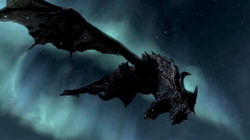 The Elder Scrolls Skyrim Dragonborn Standing on Mountain Peak Gaming Wallpaper 4K