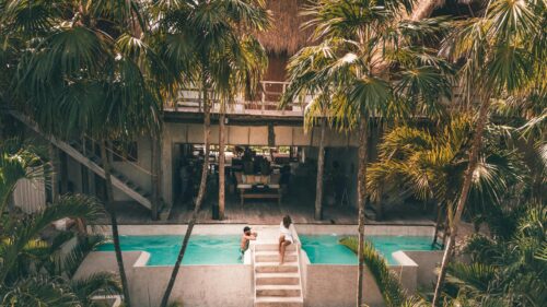 Luxury Tropical Villa Poolside Relaxation 4K Desktop Wallpaper