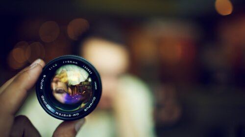 Vintage Olympus G Zuiko Camera Lens Reflected Portrait Desktop Wallpaper