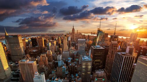 Breathtaking New York City Skyline at Golden Sunset Desktop Wallpaper