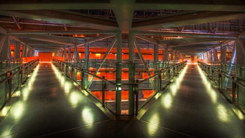 Modern Architectural Interior with Symmetrical Walkways 4K Wallpaper