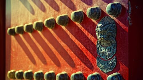 Traditional Chinese Red Door with Bronze Lion Knocker PC Wallpaper
