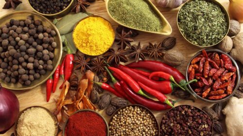Vibrant Assortment of Aromatic Spices and Herbs Desktop Wallpaper
