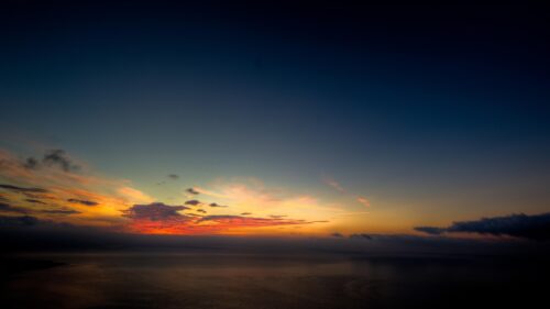 Stunning Golden Hour Sunset Over Calm Ocean Desktop Wallpaper