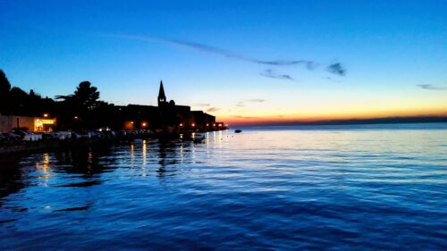 Stunning Coastal Sunset Silhouette with Mediterranean Town PC Wallpaper