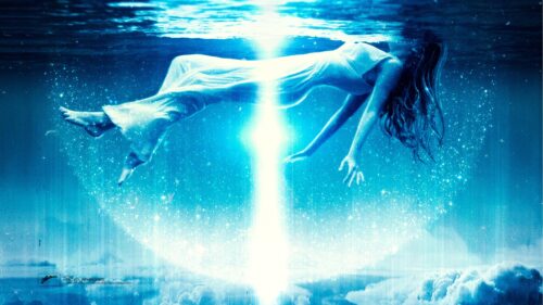 Ethereal Woman Floating Underwater with Glowing Light Beam PC Wallpaper