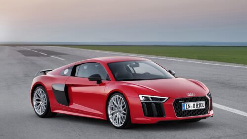 Stunning Red Audi R8 V10 Sports Car on Open Road PC Wallpaper