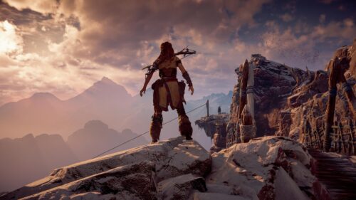 Aloy Standing on Snowy Mountain Peak Horizon Zero Dawn 4K Wallpaper