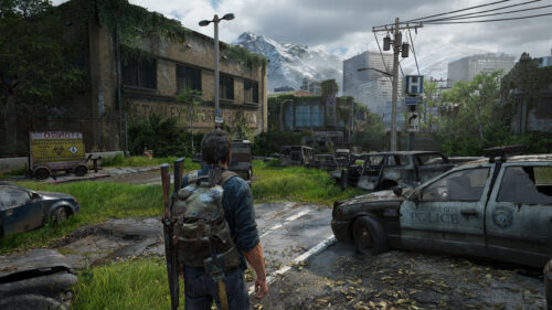 The Last of Us Joel Miller Post Apocalyptic City Scene 4K Wallpaper