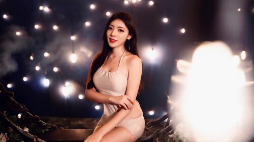 Beautiful Asian Woman in Elegant Dress with Bokeh Lights Background PC Wallpaper
