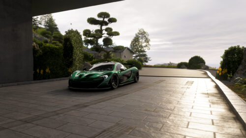 Stunning Green McLaren P1 Supercar in Modern Architectural Setting PC Wallpaper