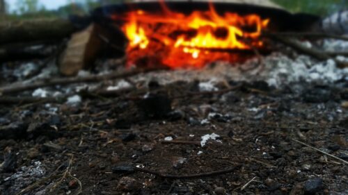 Cozy Campfire Embers and Glowing Flames Macro 4K Wallpaper
