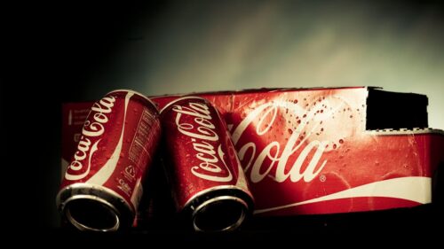 Chilled Coca Cola Cans and Packaging Cinematic Desktop Wallpaper