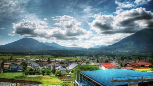 Beautiful Japanese Rural Village Landscape with Majestic Mountains 4K Wallpaper
