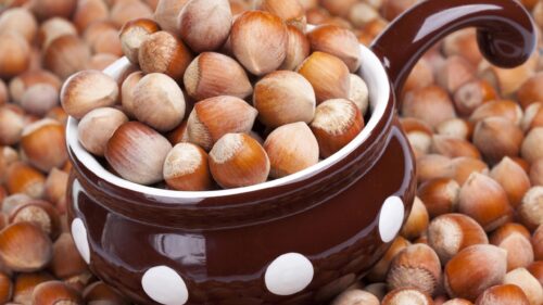 Fresh Brown Hazelnuts in a Polka Dot Pot Desktop Wallpaper