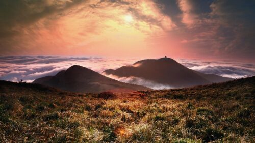 Breathtaking Mountain Peak Above The Clouds Sunset Desktop Wallpaper