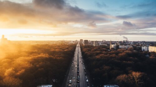 Aerial City Highway at Golden Sunset Over Forest Park PC Wallpaper