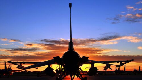 Stunning Fighter Jet Silhouette at Sunset Aviation PC Wallpaper