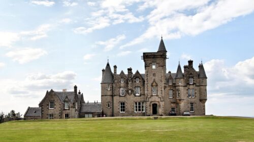Majestic Scottish Castle Architecture Scenic Landscape 4K Wallpaper