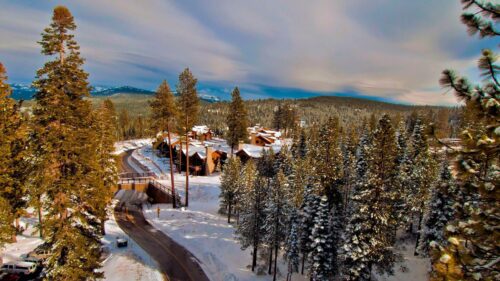 Winter Mountain Resort Road with Snow Covered Pine Trees Desktop Wallpaper