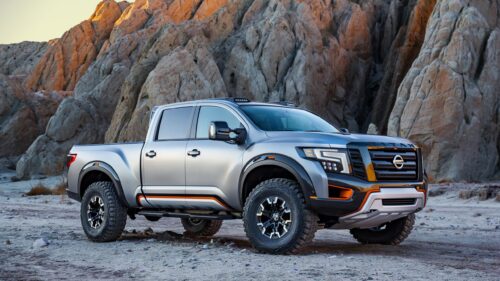 Rugged Nissan Titan Off-Road Truck in Desert Landscape 4K Wallpaper