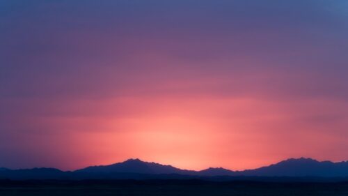 Stunning Sunset Over Dark Mountain Silhouettes Desktop Wallpaper