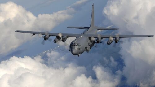US Air Force AC-130 Gunship Flying Above The Clouds Desktop Wallpaper