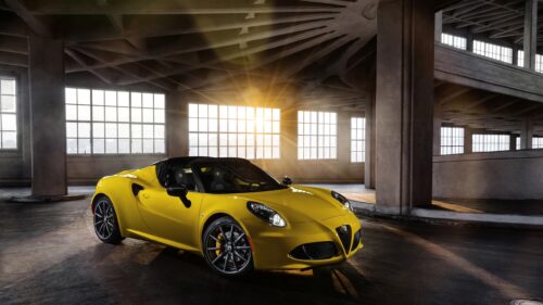 Stunning Yellow Alfa Romeo 4C Spider in Industrial Warehouse PC Wallpaper