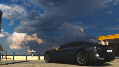 Stunning Black Ferrari F12berlinetta on Beachside Promenade 4K Wallpaper
