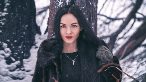 Beautiful Woman with Long Black Hair in Snowy Winter Forest PC Wallpaper