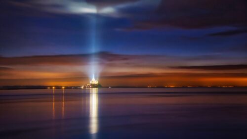 Mont Saint Michel Night View with Glowing Beacon 4K PC Wallpaper