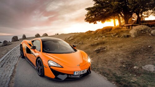 Stunning Orange McLaren 570S Supercar at Sunset 4K Desktop Wallpaper