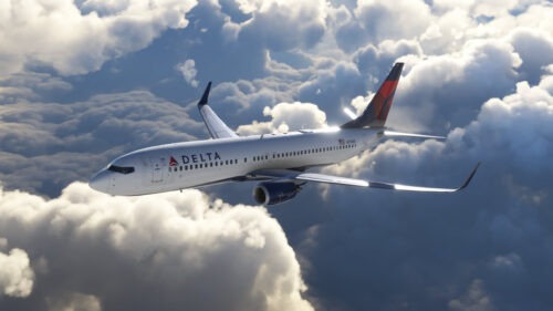 Delta Airlines Boeing 737 Flying Above The Clouds 4K Desktop Wallpaper