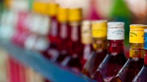 Macro Photography of Colorful Glass Liquor Bottles 4K Wallpaper